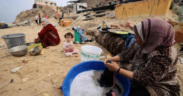 Women and girls in Gaza cut up tents to use in place of period products