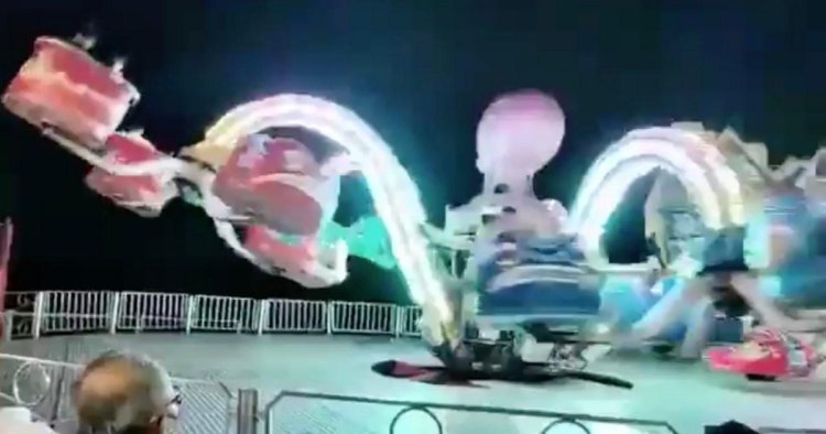 Moment two people are thrown from fairground ride into metal fence