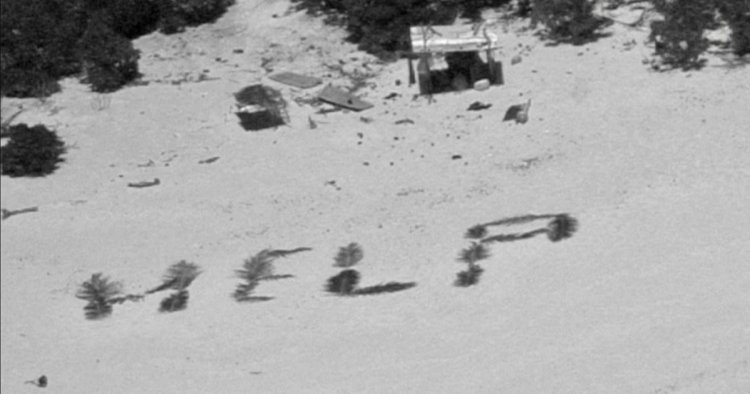 Castaways rescued after writing message on sand using palm leaves