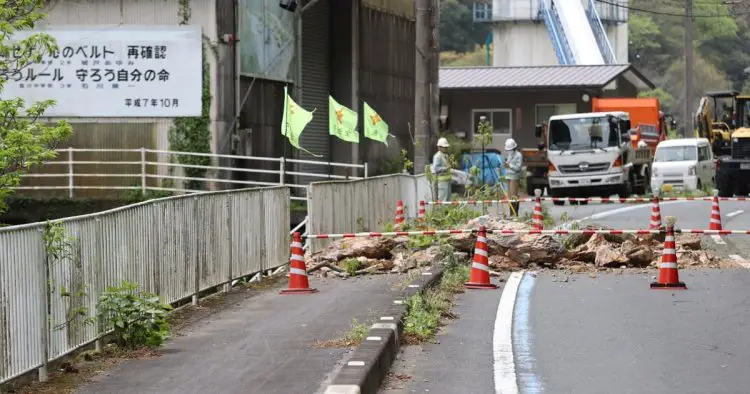 Powerful earthquake rocks Japan sending debris flying and blocking roads