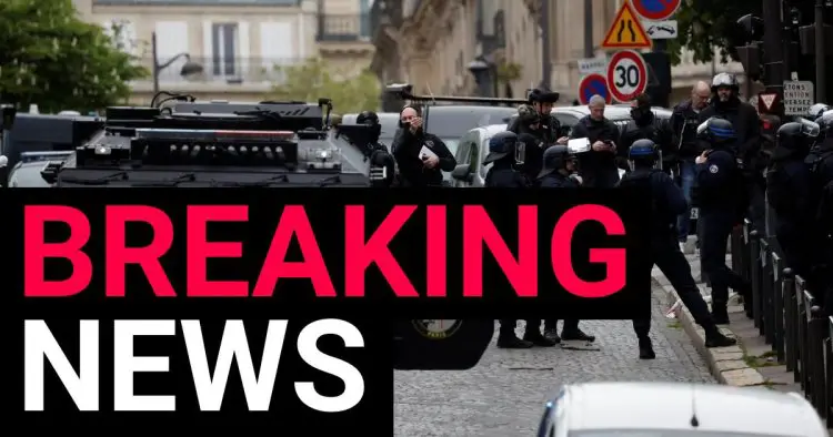 Paris on lockdown after man threatens to detonate explosive belt